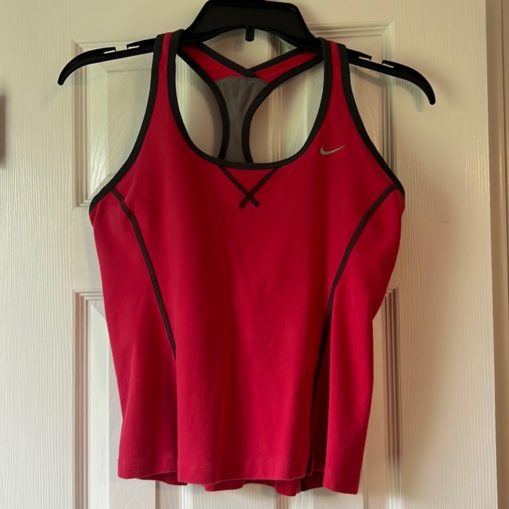 Nike Dri-Fit workout top with built in bra.Size Large coral color